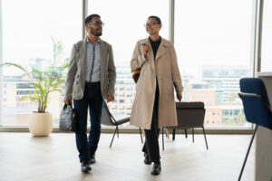 Office workers walking together in hallway