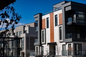 Exterior view of modern apartment building offering luxury units.