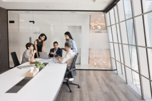 Five diverse teammates solve business-related matters during briefing