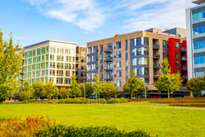 Modern Downtown Streetscape Featuring Mixed-Use Residential and Office Buildings.