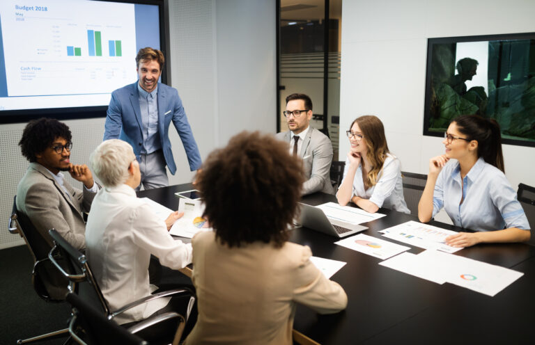 Business colleagues in conference meeting room presentation