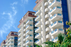 A beautiful modern residential complex consisting of several high-rise apartment buildings.