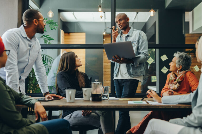 Diverse business team having a meeting in a creative workplace