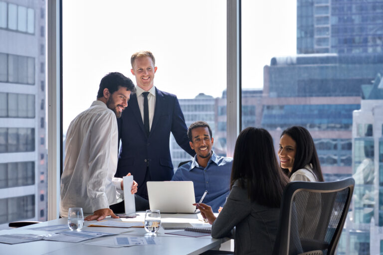 Professional happy diverse team business people talking at office meeting.