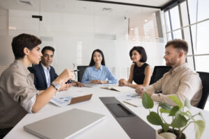 Diverse team of colleagues meeting for corporate discussion