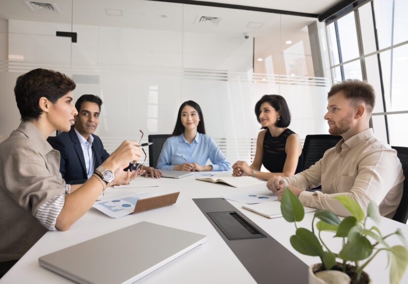 Diverse team of colleagues meeting for corporate discussion