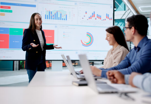 Team Of Diverse Professionals Analyzing Financial Data