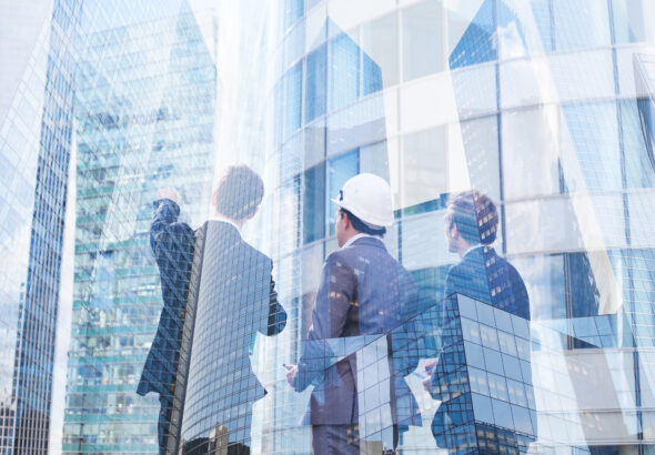 group of business people discussing real estate project, construction of new building, cooperation of architect, designer and manager