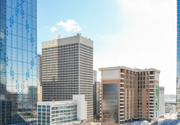 Panorama aerial view of downtown Dallas, Texas during sunny autumn day with colorful fall foliages