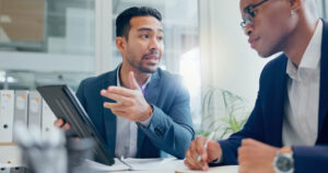 Teamwork, financial or business people in meeting with tablet for info, planning and investment in office. Collaboration, bankers or technology for growth in workplace for profit or corporate project